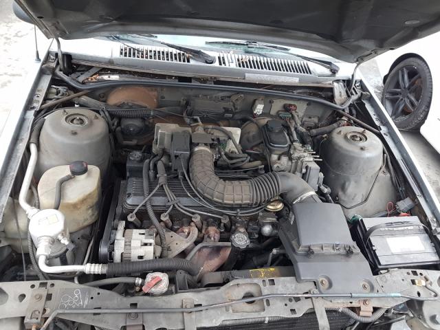 1G1JC5449R7165516 - 1994 CHEVROLET CAVALIER V GRAY photo 7