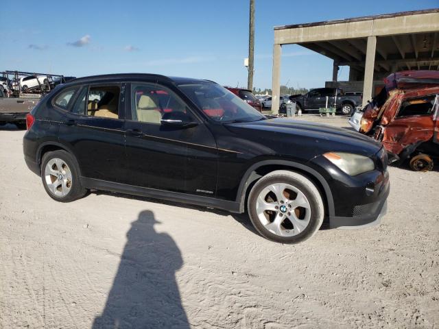 WBAVM1C55FVZ93799 - 2015 BMW X1 SDRIVE2 BLACK photo 4