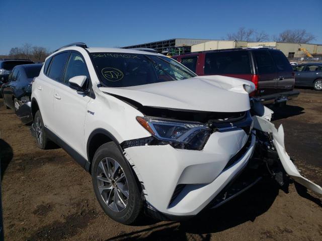 JTMRJREV7JD248348 - 2018 TOYOTA RAV4 HV LE WHITE photo 1