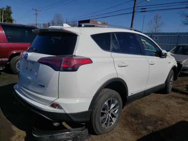 JTMRJREV7JD248348 - 2018 TOYOTA RAV4 HV LE WHITE photo 4