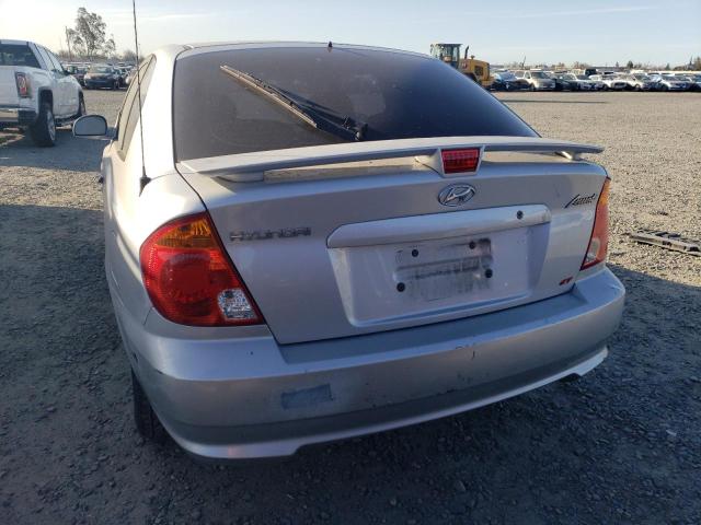 KMHCG35C85U365793 - 2005 HYUNDAI ACCENT SILVER photo 6