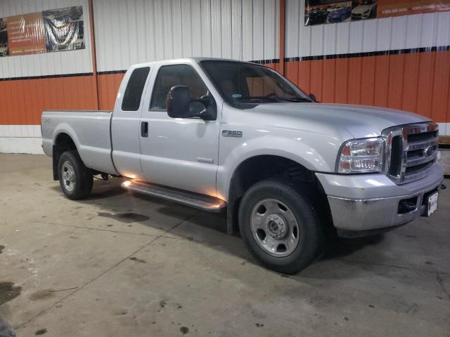 1FTWX31P97EA64814 - 2007 FORD F350 SRW S GRAY photo 4