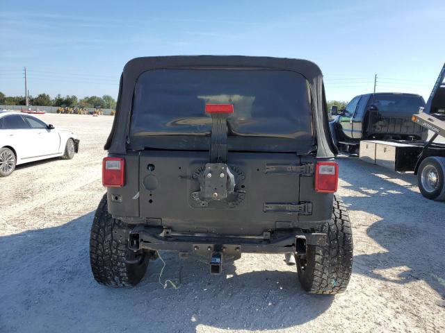 1C4BJWEG5DL568294 - 2013 JEEP WRANGLER U BLACK photo 6