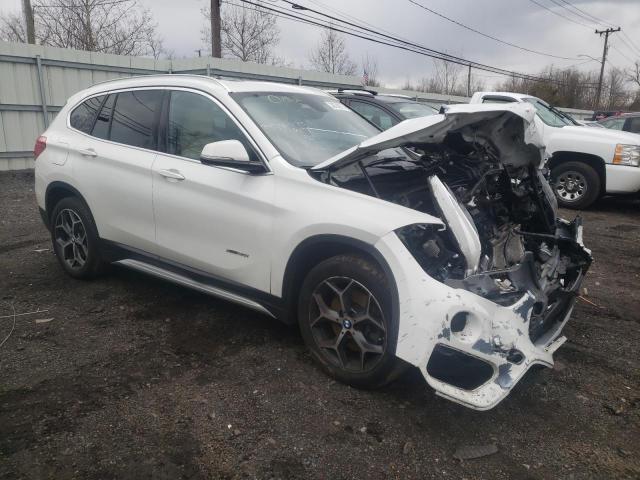 WBXHT3Z35H4A55966 - 2017 BMW X1 XDRIVE2 WHITE photo 4