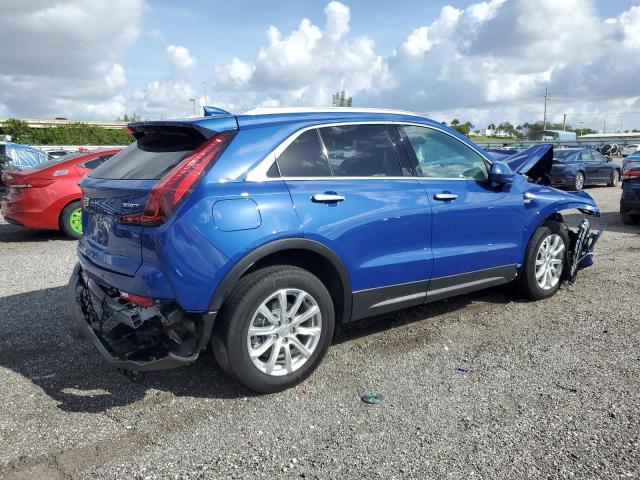 1GYAZAR43NF107791 - 2022 CADILLAC XT4 LUXURY BLUE photo 4