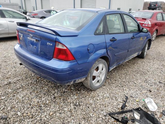 1FAFP34N05W183553 - 2005 FORD FOCUS ZX4 BLUE photo 4