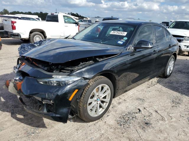 WBA8E5G51JNU47134 - 2018 BMW 320 XI BLACK photo 1