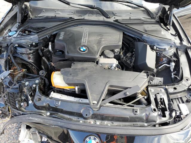 WBA8E5G51JNU47134 - 2018 BMW 320 XI BLACK photo 11