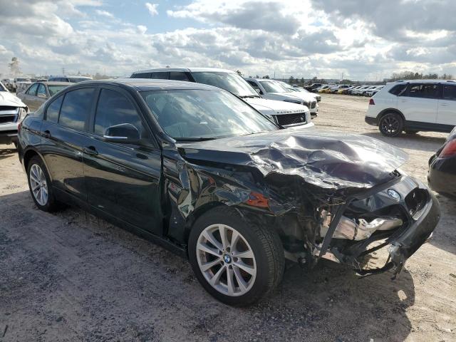 WBA8E5G51JNU47134 - 2018 BMW 320 XI BLACK photo 4