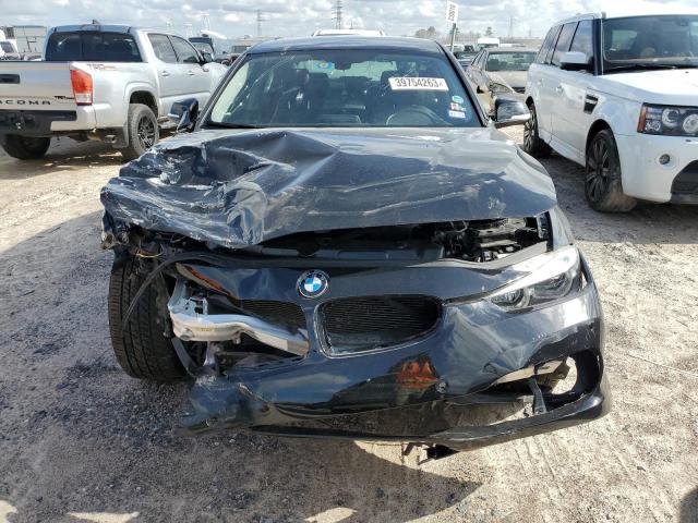 WBA8E5G51JNU47134 - 2018 BMW 320 XI BLACK photo 5