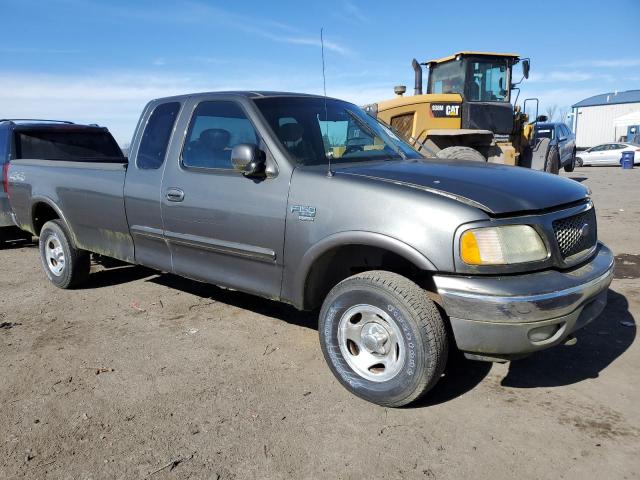 1FTRX18L03NB65609 - 2003 FORD F150 GRAY photo 4