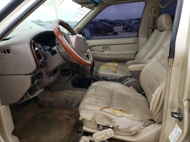 JN8DR09Y12W706690 - 2002 NISSAN PATHFINDER TAN photo 7