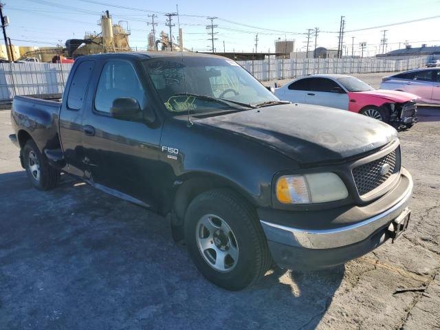 1FTRX07L4YKA69163 - 2000 FORD F150 BLUE photo 4