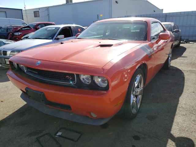 2B3LJ54T69H535162 - 2009 DODGE CHALLENGER ORANGE photo 1