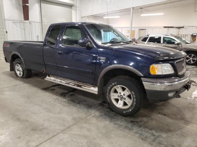 2FTRX18L52CA52694 - 2002 FORD F-150 BLUE photo 4