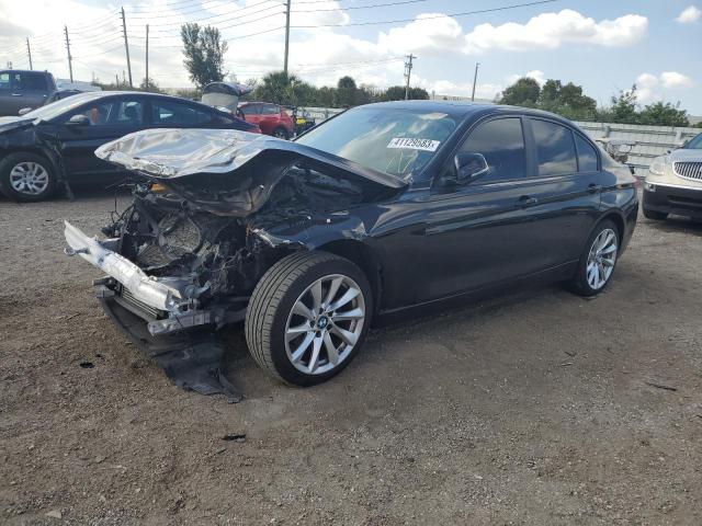 WBA8E5G56JNU45735 - 2018 BMW 320 XI BLACK photo 1
