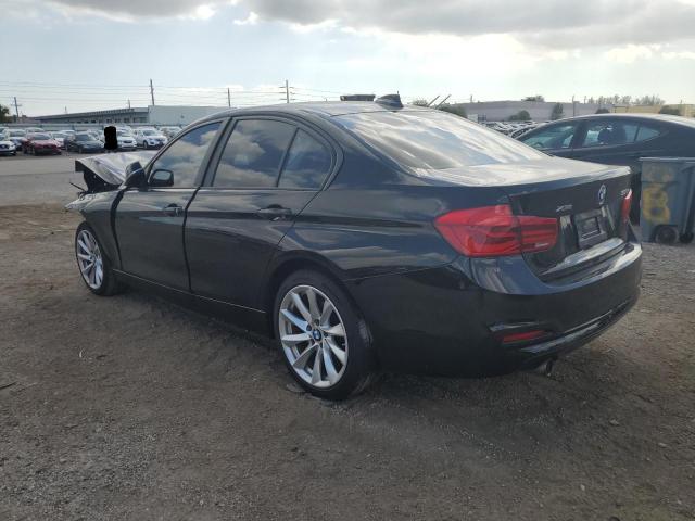 WBA8E5G56JNU45735 - 2018 BMW 320 XI BLACK photo 2