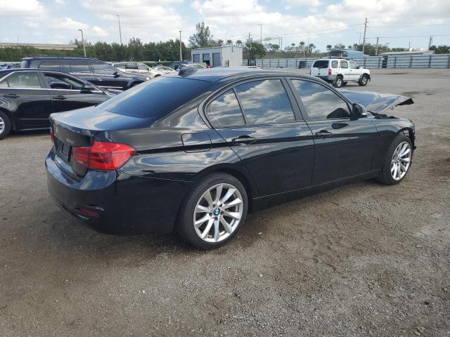 WBA8E5G56JNU45735 - 2018 BMW 320 XI BLACK photo 3