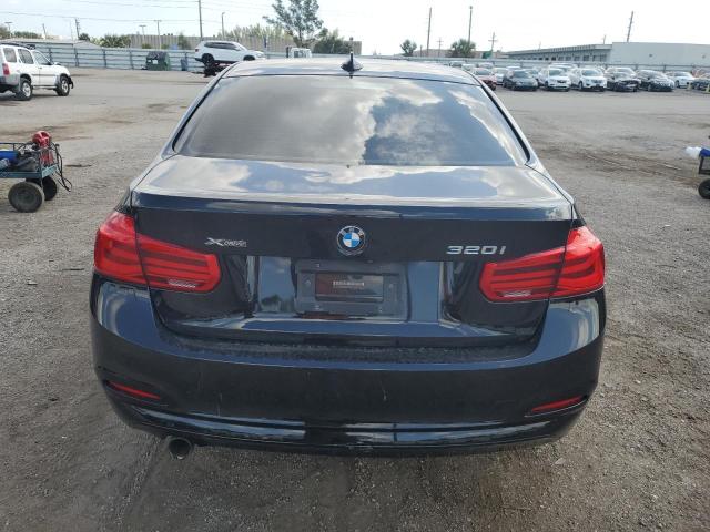 WBA8E5G56JNU45735 - 2018 BMW 320 XI BLACK photo 6