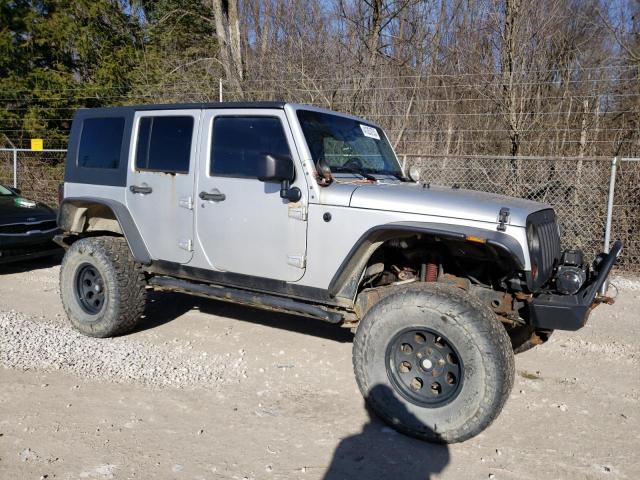 1J8GA59129L714477 - 2009 JEEP WRANGLER U SILVER photo 4