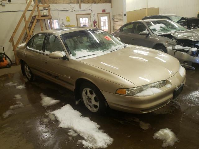 1G3WX52H0YF196343 - 2002 OLDSMOBILE INTRIGUE TAN photo 4