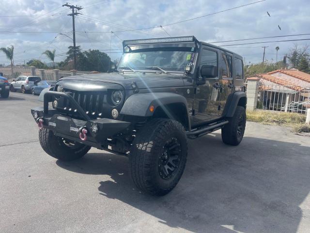 1C4BJWDG7GL310266 - 2016 JEEP WRANGLER U ნაცრისფერი ფოტო 2