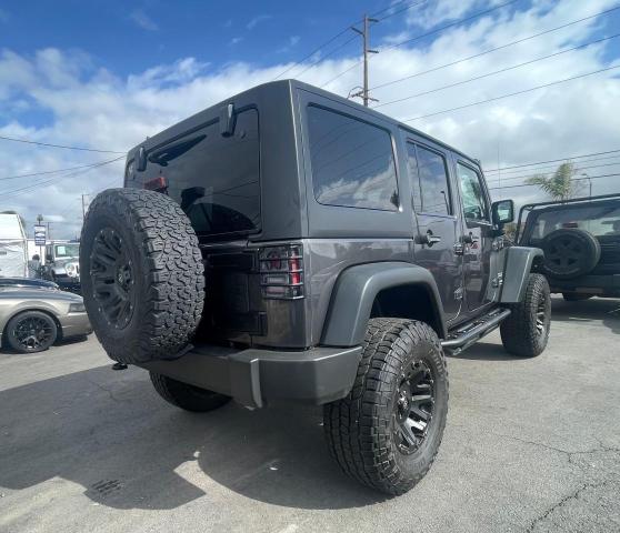 1C4BJWDG7GL310266 - 2016 JEEP WRANGLER U ნაცრისფერი ფოტო 4