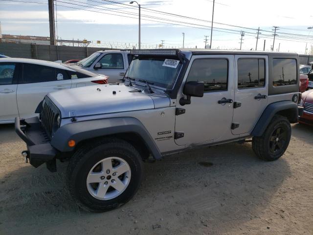 1C4HJWDG1JL855588 - 2018 JEEP WRANGLER U ვერცხლისფერი ფოტო 1