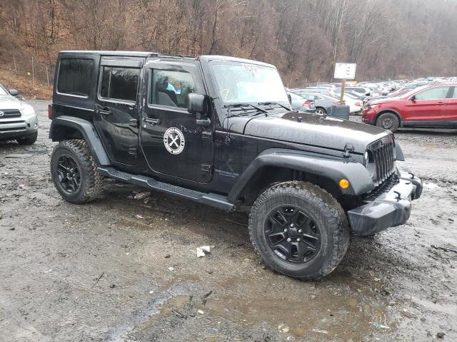 1C4BJWDG3GL224517 - 2016 JEEP WRANGLER U შავი ფოტო 4