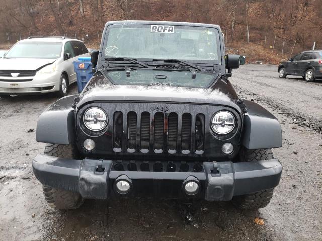 1C4BJWDG3GL224517 - 2016 JEEP WRANGLER U შავი ფოტო 5