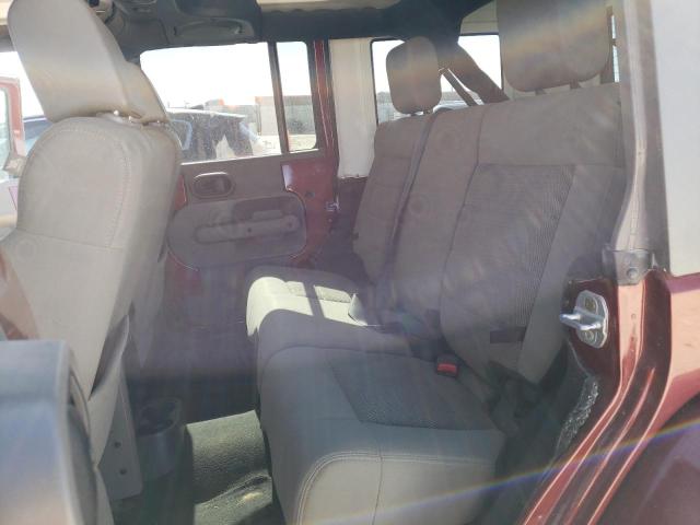 1J4GA59109L769687 - 2009 JEEP WRANGLER U BURGUNDY photo 10