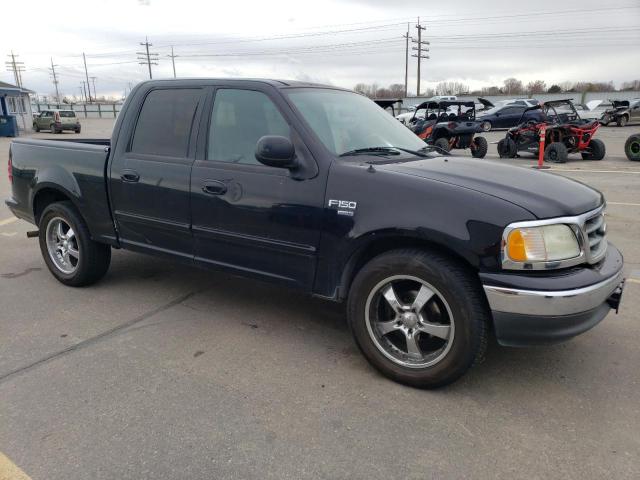 1FTRW07L33KC09392 - 2003 FORD F150 SUPER BLACK photo 4