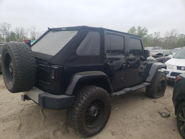 1J4BA5H11BL577664 - 2011 JEEP WRANGLER UNLIMITED SAHARA  ფოტო 4