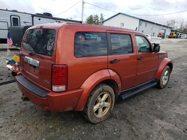 1D8GU58K67W570342 - 2007 DODGE NITRO SLT ORANGE photo 4