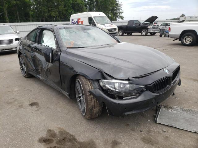 WBA4W7C58KAG52586 - 2019 BMW 440I BLACK photo 1