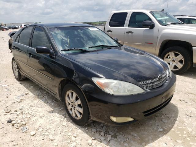 JTDBF32K230115727 - 2003 TOYOTA CAMRY LE BLACK photo 1