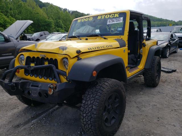 1J4BA6D14BL556660 - 2011 JEEP WRANGLER R YELLOW photo 2