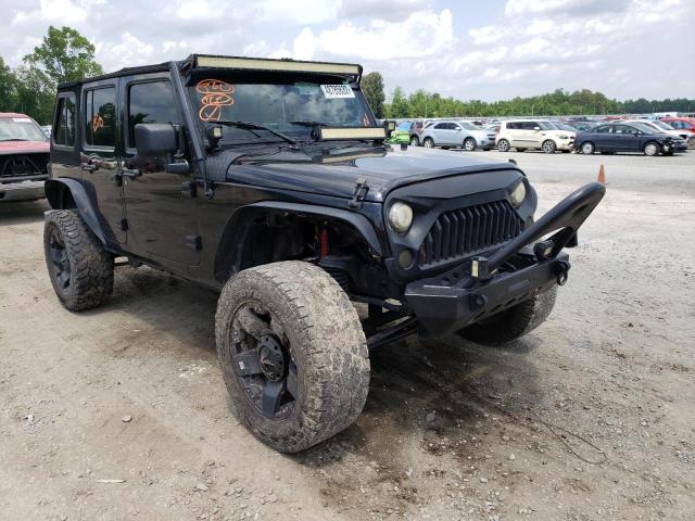 1J4BA3H16AL117919 - 2010 JEEP WRANGLER U BLACK photo 1