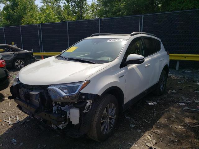 JTMRJREV0JD251429 - 2018 TOYOTA RAV4 HV LE WHITE photo 2