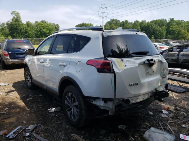 JTMRJREV0JD251429 - 2018 TOYOTA RAV4 HV LE WHITE photo 3