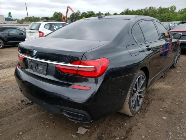 WBA7E4C59KGV70584 - 2019 BMW 740 XI შავი ფოტო 4