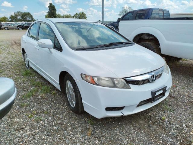 JHMFA3F26BS000432 - 2011 HONDA CIVIC HYBR WHITE photo 1