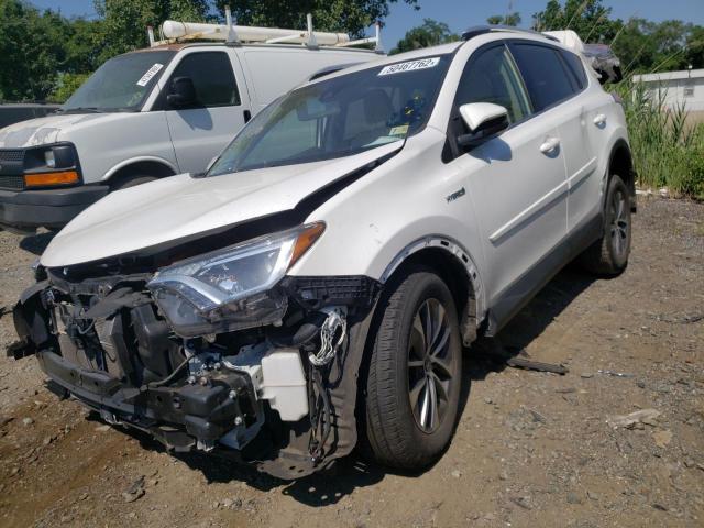 JTMRJREV8GD045767 - 2016 TOYOTA RAV4 HV XL WHITE photo 2