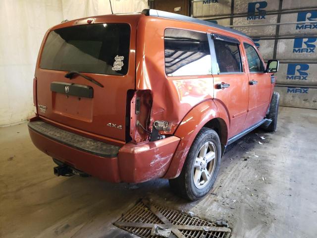 1D8GU28K57W726577 - 2007 DODGE NITRO SXT ORANGE photo 4