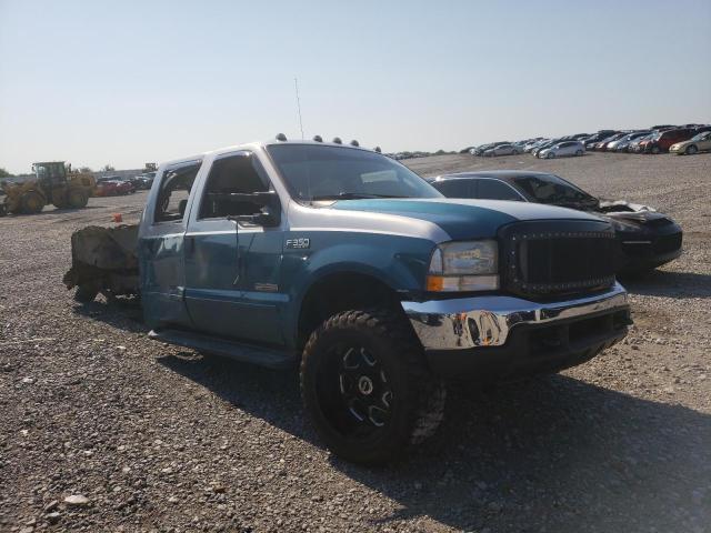 1FTSW31P74EC91156 - 2004 FORD F350 SRW S BLUE photo 1