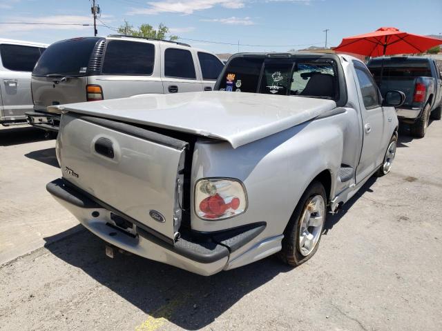 2FTZF07362CA84973 - 2002 FORD F150 SVT L SILVER photo 4