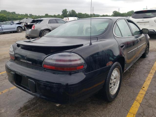 1G2WJ52K6VF309886 - 1997 PONTIAC GRAND PRIX BLACK photo 4