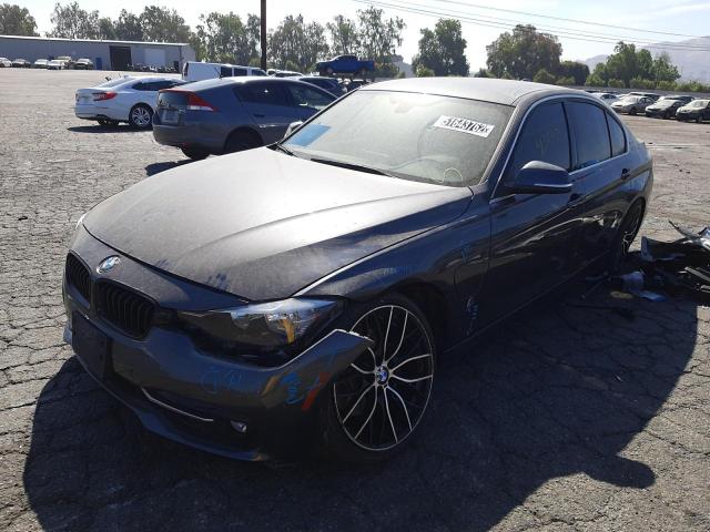 WBA8E1C37HA156393 - 2017 BMW 330E Schwarz Foto 2