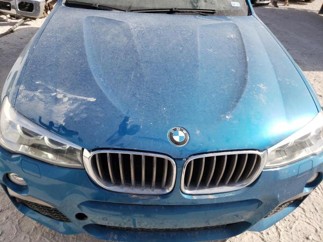 5UXXW7C54J0W63908 - 2018 BMW X4 XDRIVEM BLUE photo 7