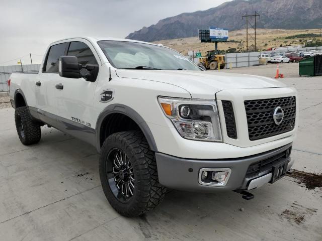 1N6BA1F47JN519571 - 2018 NISSAN TITAN XD S WHITE photo 1